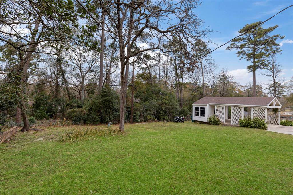 There is ample storage behind the carport.