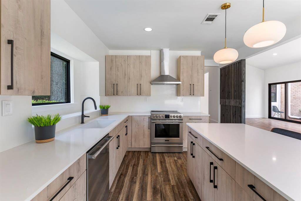 Everything is within reach in the kitchen. Brand new stainless steel appliances!