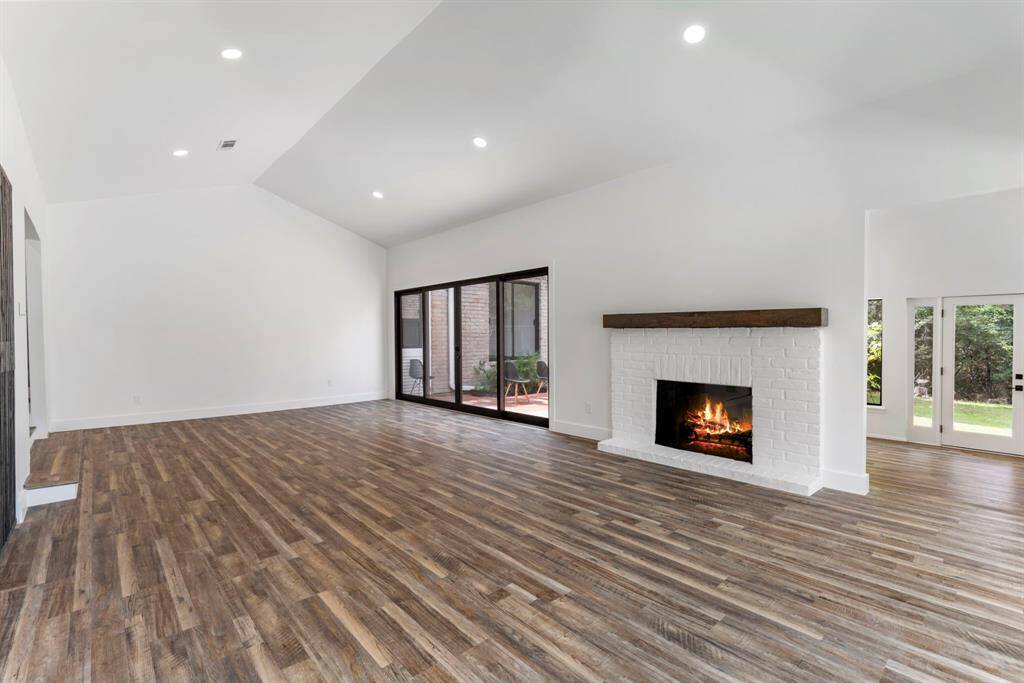 Endless possibilities!!! Family room and dining room.