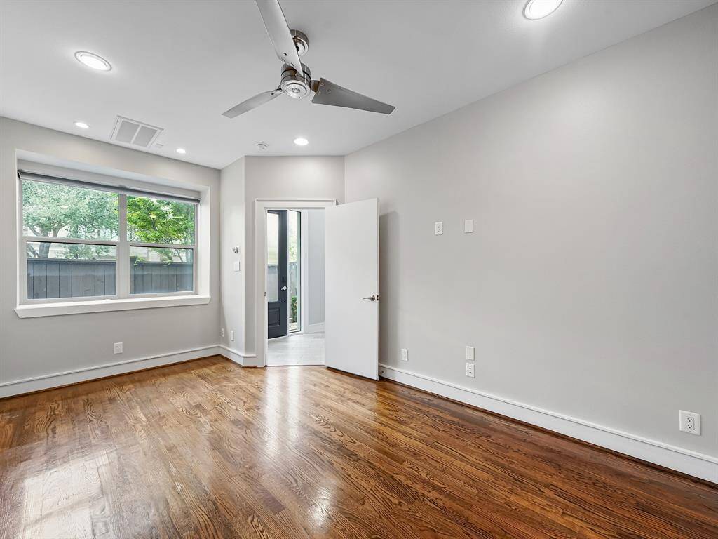 The first floor boasts a convenient secondary bedroom with a private ensuite bathroom, offering a haven of comfort and privacy. This adaptable room can easily transform to meet your unique needs, whether you desire a guest suite, a peaceful home office, or a creative studio.