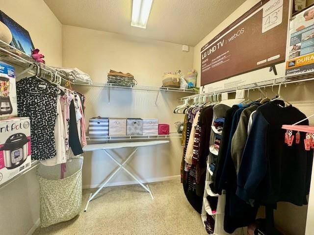 Very large closet in bathroom.