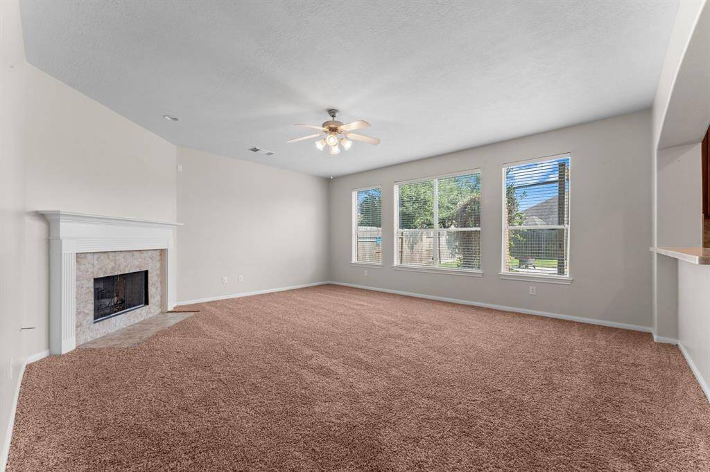 Living room with views of the backyard oasis