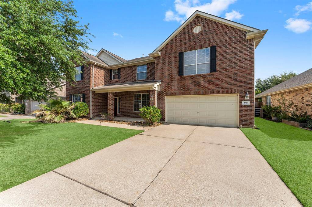 Double wide driveway and two car garage