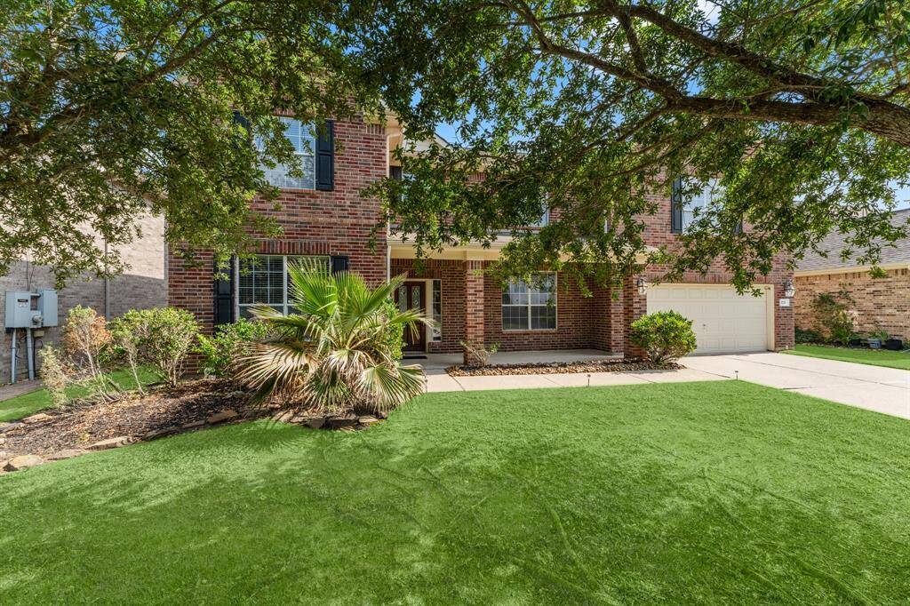 Healthy trees and spacious front porch