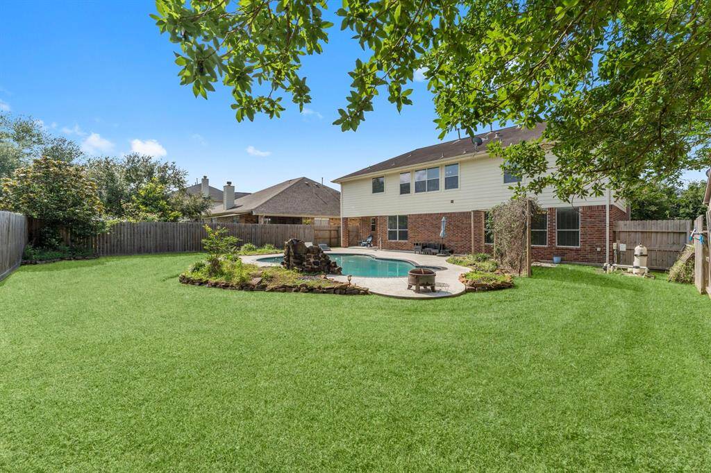 The large backyard has enough room for all your toys