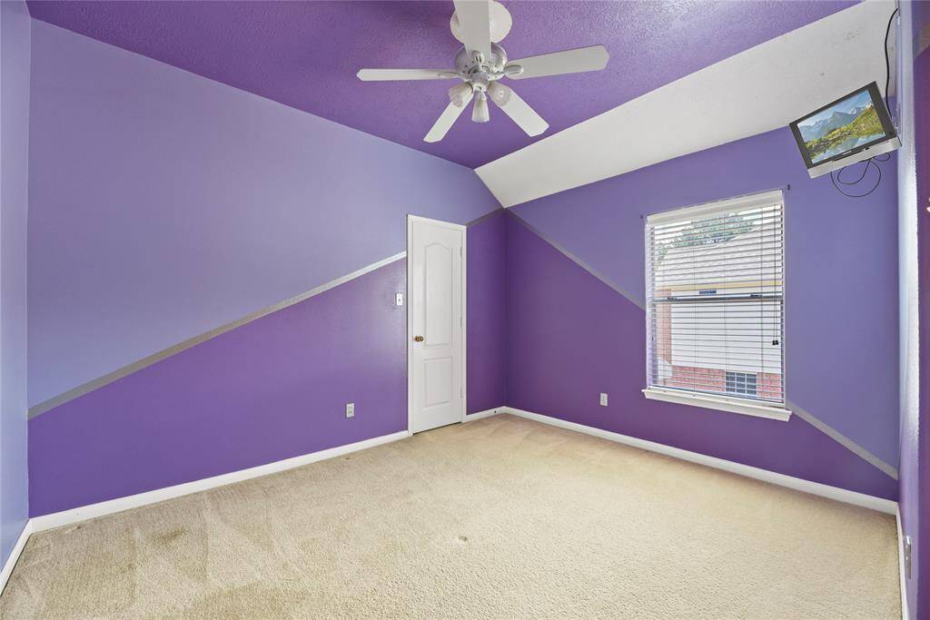 Upstairs secondary bedroom with a Jack 'n Jill bathroom.