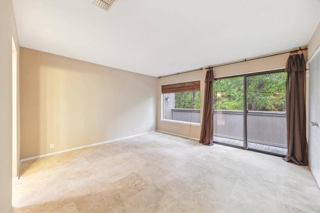 Ensuite bathroom includes built in cabinets and drawers with soft close doors. The skylight is a lovely touch and offers natural light.
