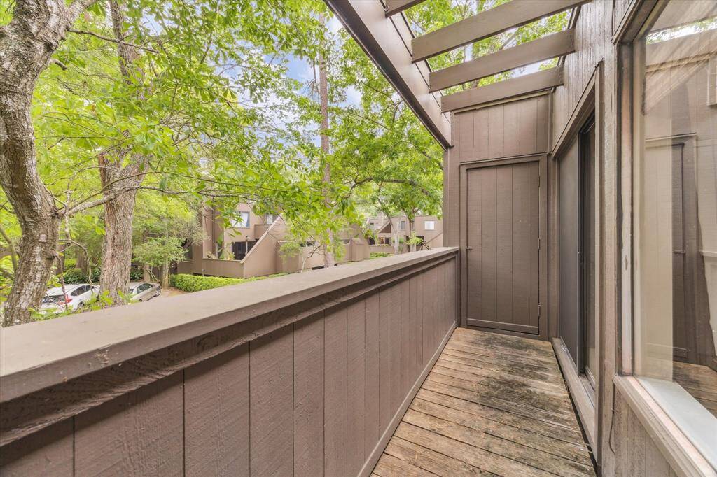 Secondary room upstairs is perfect for a home office, work space, guest bedroom or child's room. The large windows offer natural light and a lovely view of the surrounding landscape.