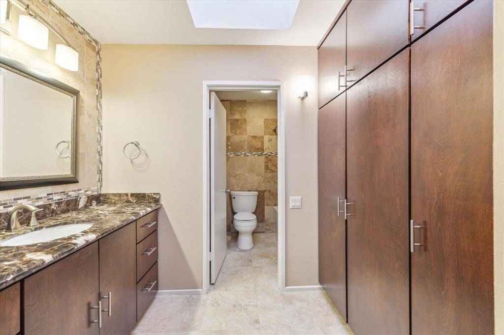 Upstairs, discover the inviting secondary room featuring an open-concept loft design. Walk in closets offer plenty of storage space.