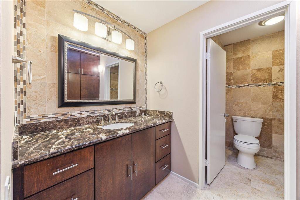 Second bathroom located upstairs.
