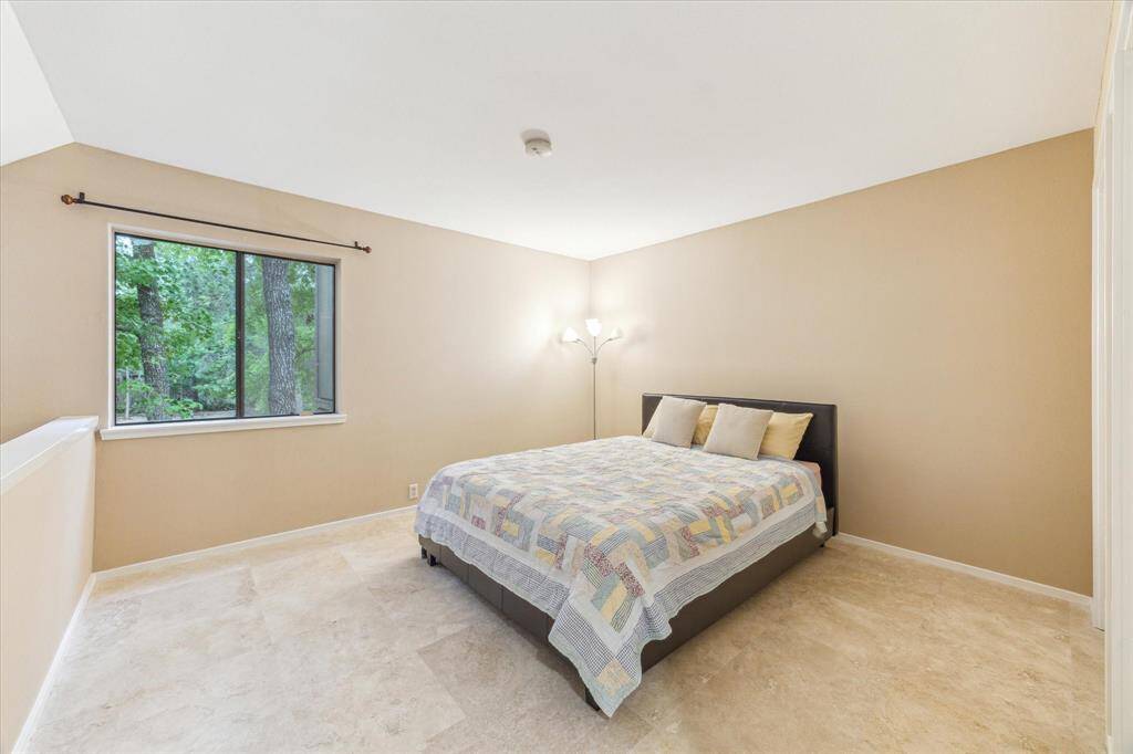 The first-floor laundry/utility room offers convenient kitchen access while remaining separate from dining and living areas.