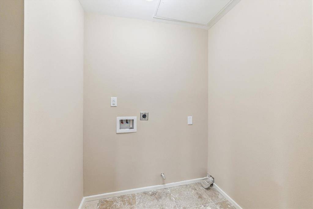 Enjoy tranquility on your private first-floor patio, perfect for morning coffee and relaxation.