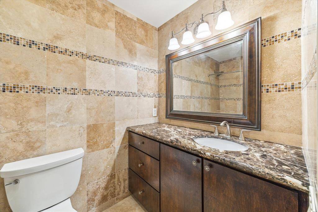 Second bathroom located upstairs.