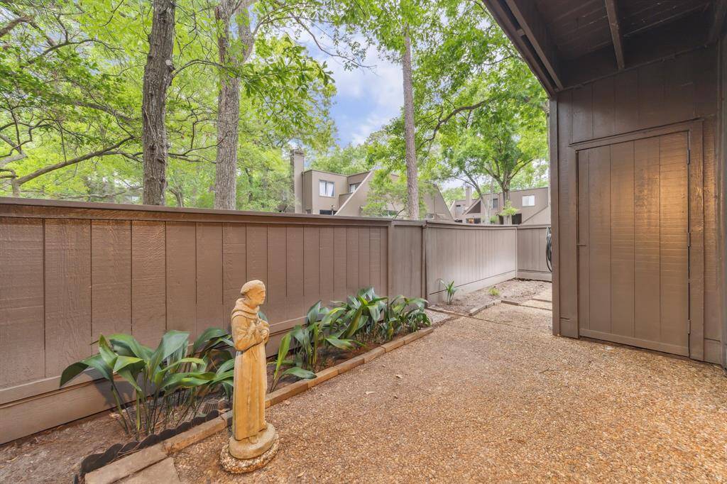 Enjoy tranquility on your private first-floor patio, perfect for morning coffee and relaxation.