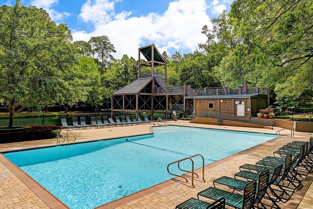 Another view of the pool perfectly located adjacent to the lake.