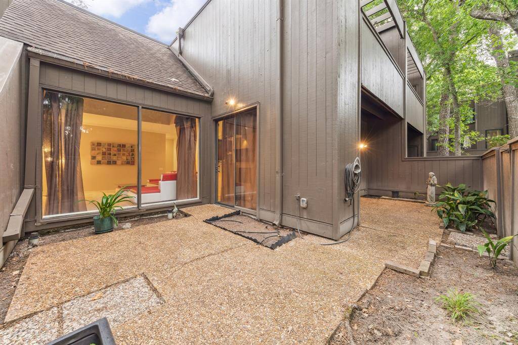 Discover the expansive private patio, perfect for an herb garden and potted plants. Enjoy the balance of shade and sunlight provided by mature trees.