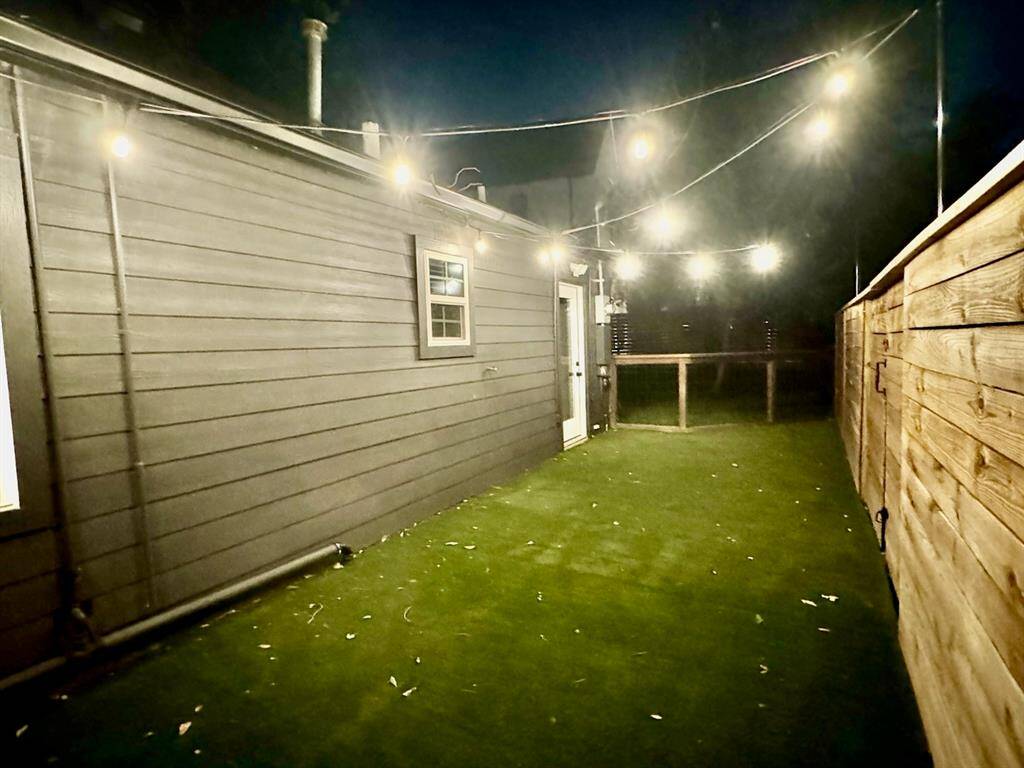Beautifully strung lights in your quiet  back yard.