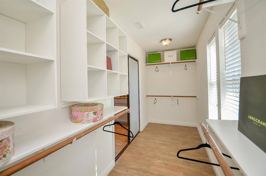 Spacious closet with shelves