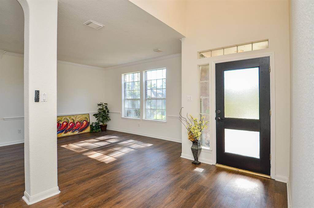 View of the formal dining on the left from the foyer