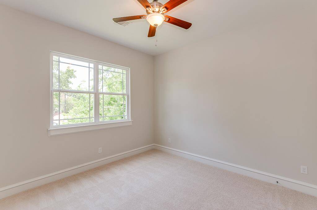 one of two spacious secondary bedrooms