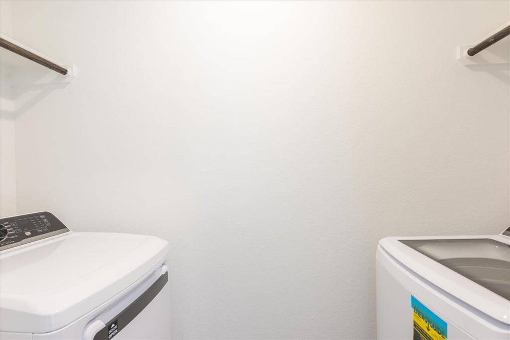 Utility room is inside the house. Washer and dryer are included.