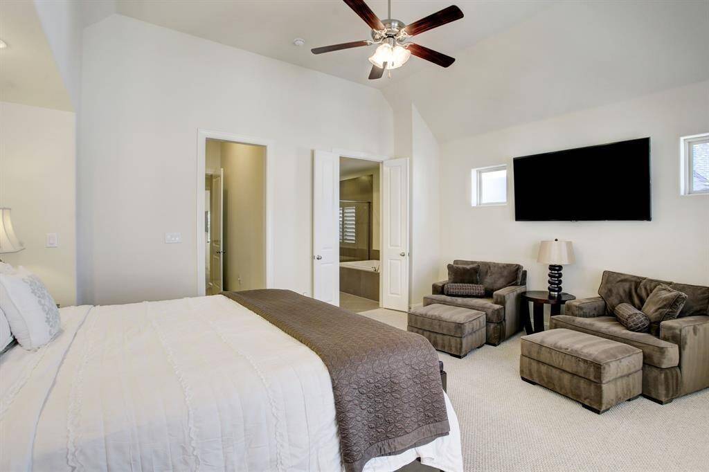 Primary Suite features 2 large walking closets and a fabulous En-suite bathroom.