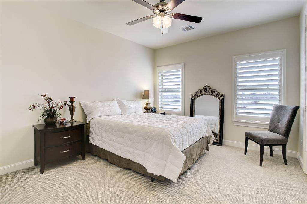 The 2nd bedroom, located on the 3rd floor features a private bathroom and a walk-in closet.