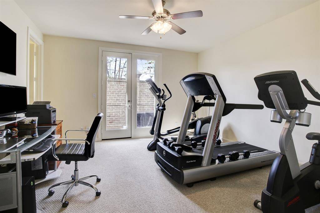 First Floor bedroom with a private bathroom, a large walking closet, and access to the back patio.