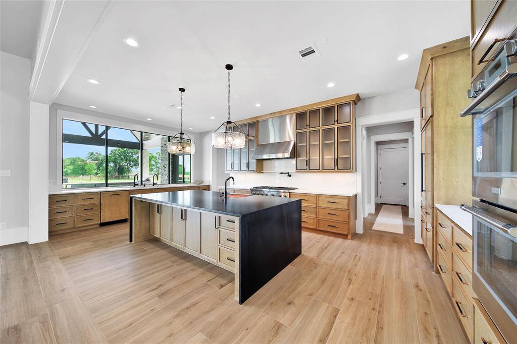 A kitchen to envy!  There is ample storage in all the solid maple cabinetry.