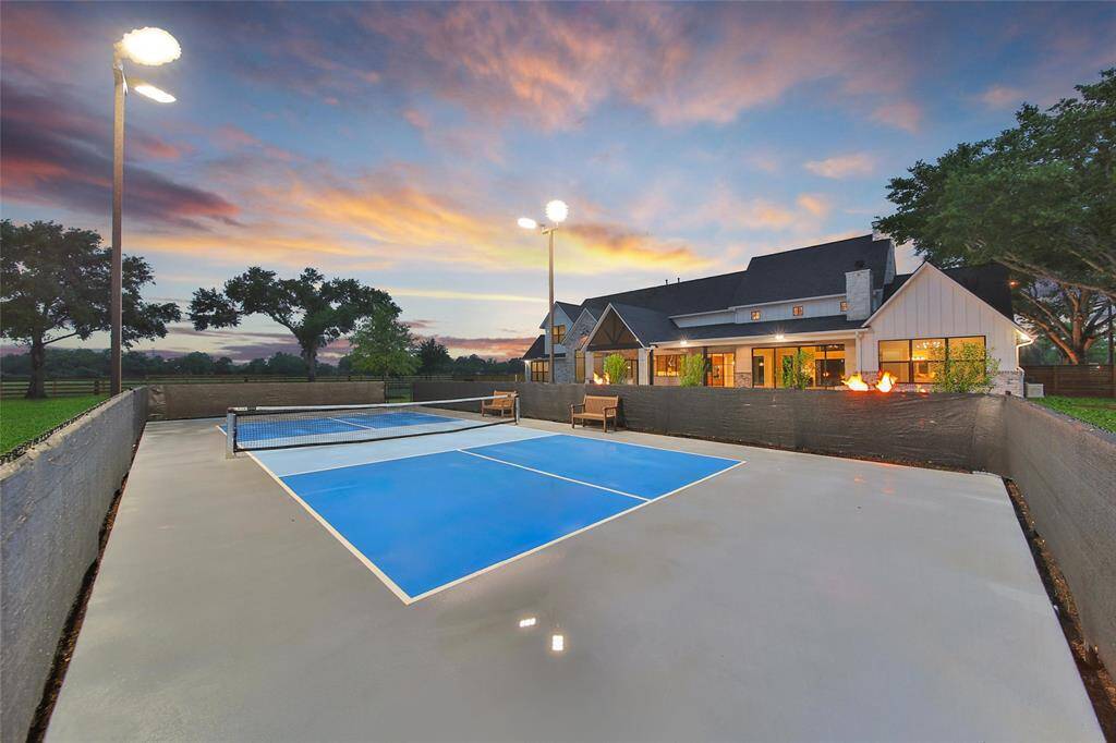Regulation Size Pickelball Court with over 110k lumens of light guaranteeing no dark spots on the court.