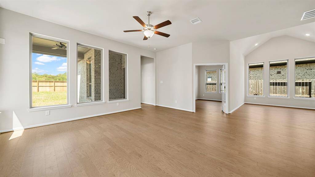 Another view of the Spacious Living Room with an open concept, allowing for ease of conversation from one area to the next.