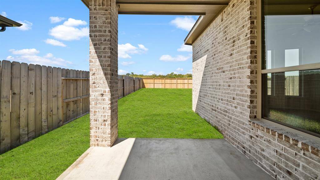 Set up your seating or BBQ Grill on this side patio, with easy access to Beautiful Backyard greenspace.