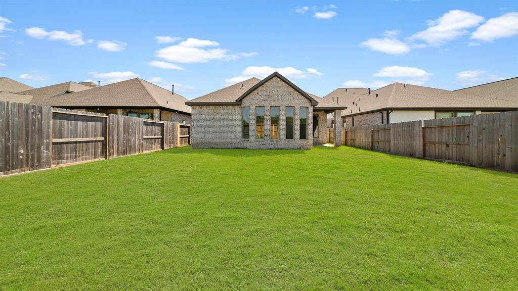 This new construction home offers a HUGE backyard with an abundance of greenspace to add playscape, plants & more!