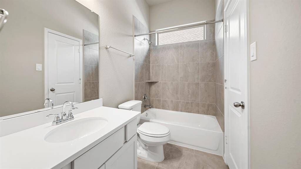 Spacious Secondary Bath is accessible to guests and offers a private entry from one of the Secondary Bedrooms