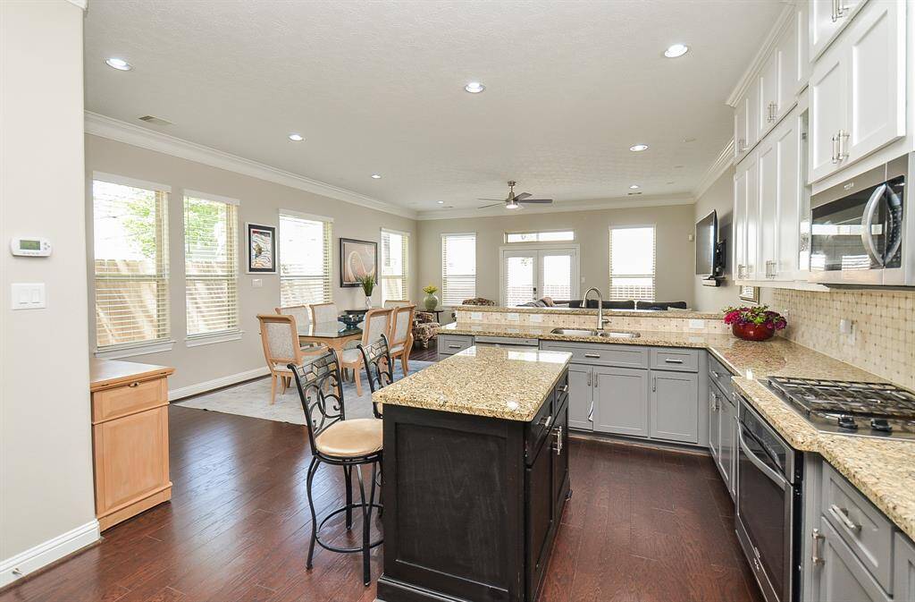 Everything in its place, just like you like it. With custom cabinetry, a double pantry, and smart storage in every corner, this kitchen keeps life tidy without trying too hard.