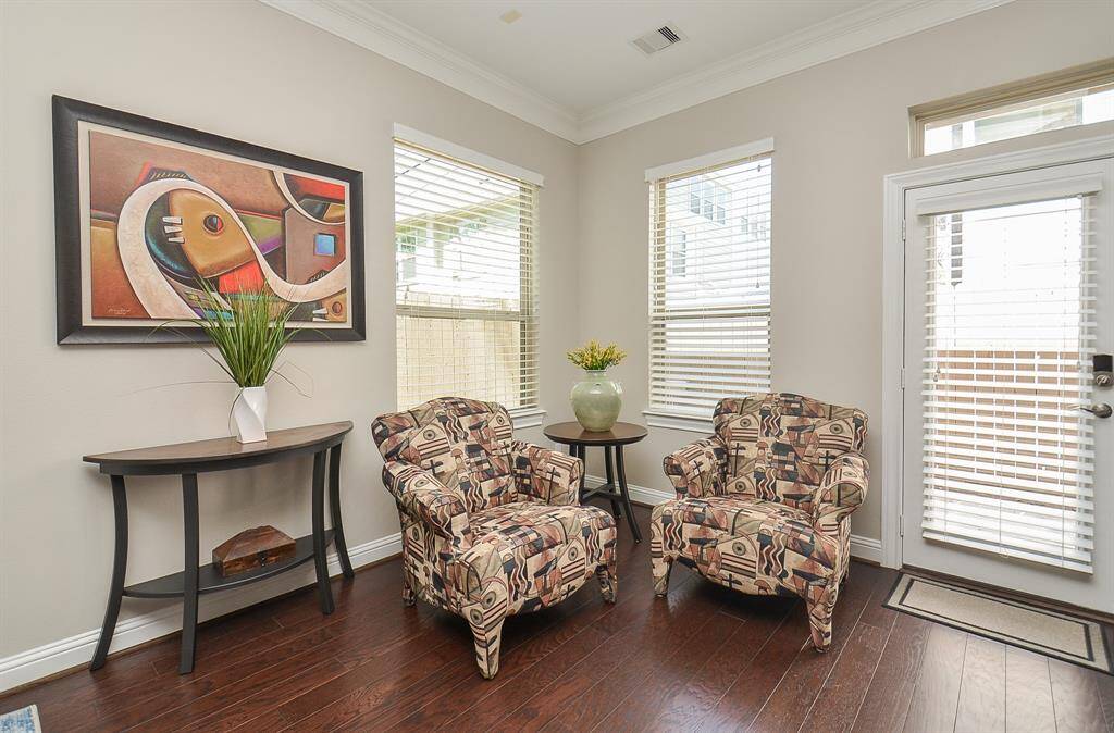 Your favorite little pause. Morning coffee, an afternoon read, or just a quiet moment in the sunlight—this bright corner makes slowing down feel easy, with windows that welcome the day in and warmth that makes it worth staying a while.