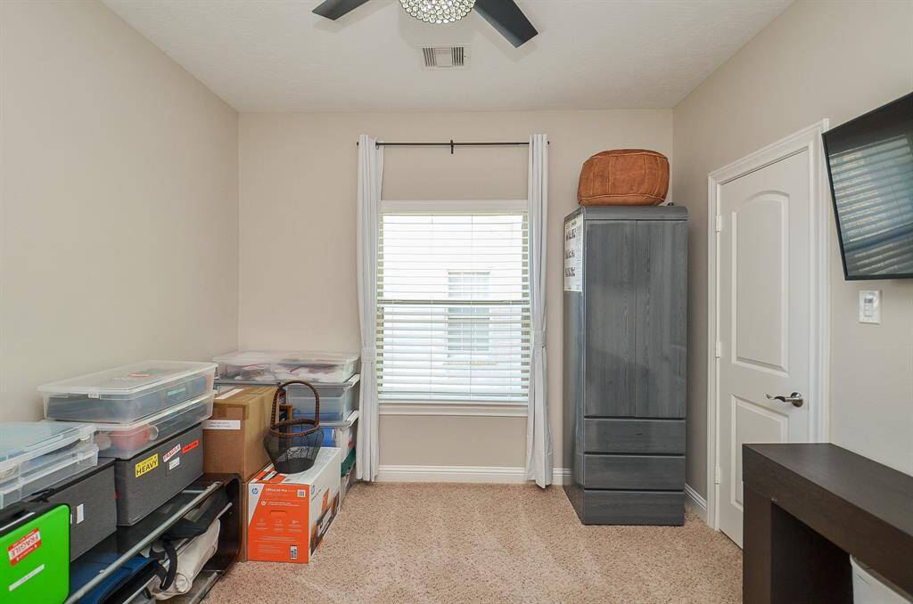 Bright, comfy, and ready for anything. Whether it’s a guest room, kid’s space, or home office, this secondary bedroom offers plenty of light, fresh paint, and room to make it your own.