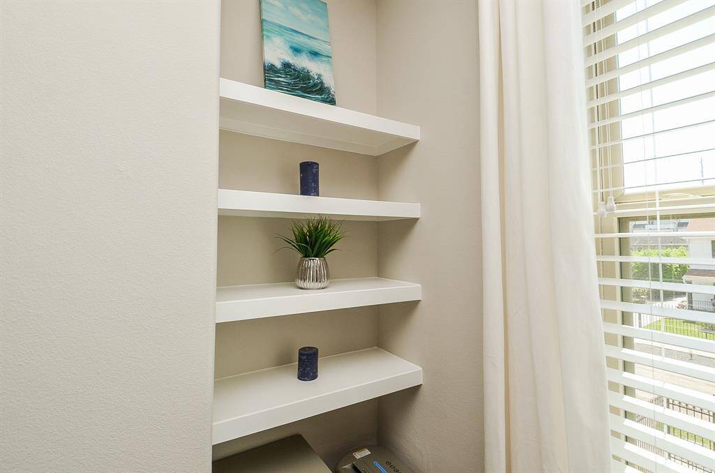 Little things, big vibes. This sunlit corner with floating shelves is perfect for your favorite books, a plant or two, and those little touches that make a house feel like home.