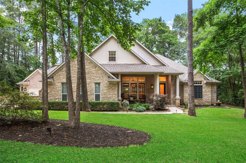 Beautifully landscaped home nestled on nearly an acre.