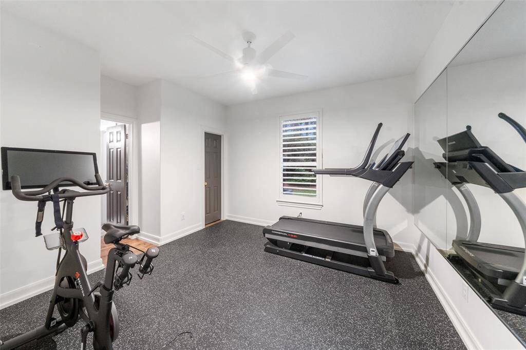 Guest bedroom that is currently being used as an exercise room. Flooring is removable and there is a large w/i closet.