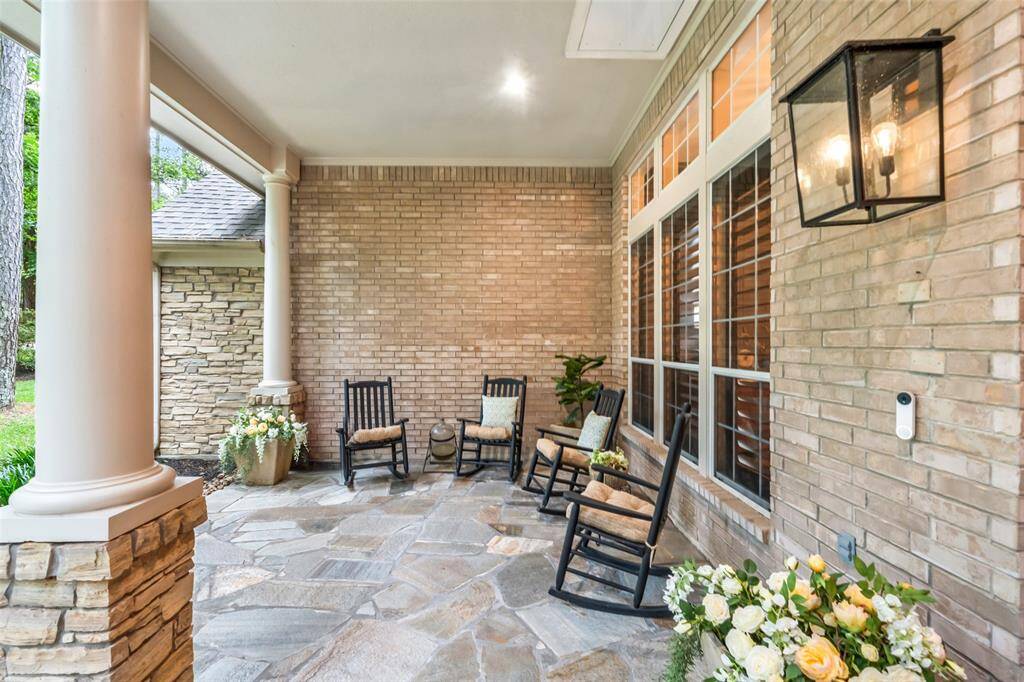 The front of the home has a beautiful patio and access to the Versa lift.