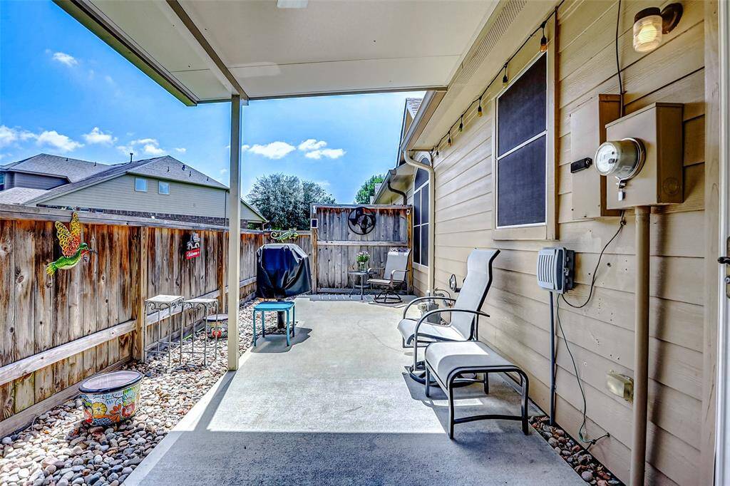 The spacious covered patio is your private oasis—perfect for enjoying morning coffee or winding down in the evening.