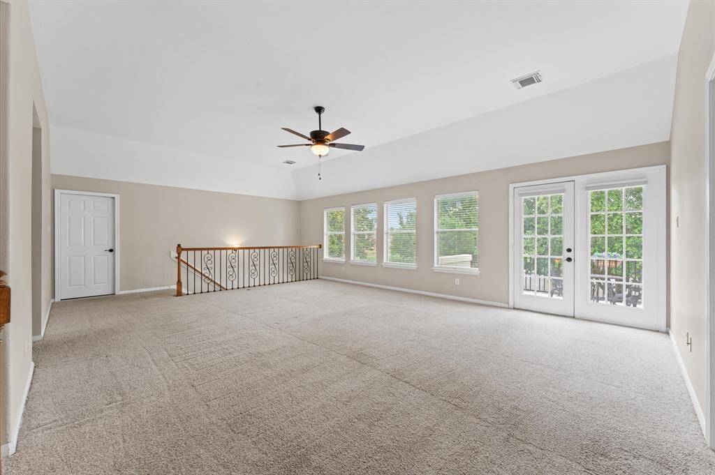 The French doors leads to a balcony!