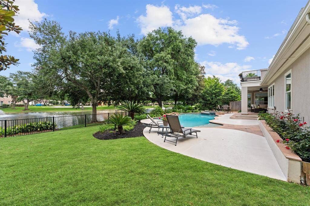 The backyard has plenty of greenspace for play equipment or pets!