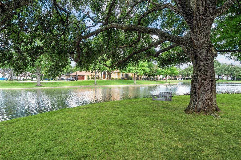 This area  with the large oak tree is accessible from the backyard. Fishing is catch and release! The lake is stocked!