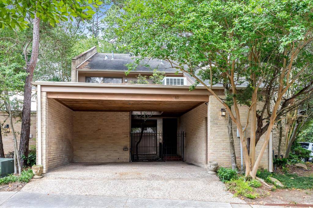 Carport for 2 cars with storage space on the right.