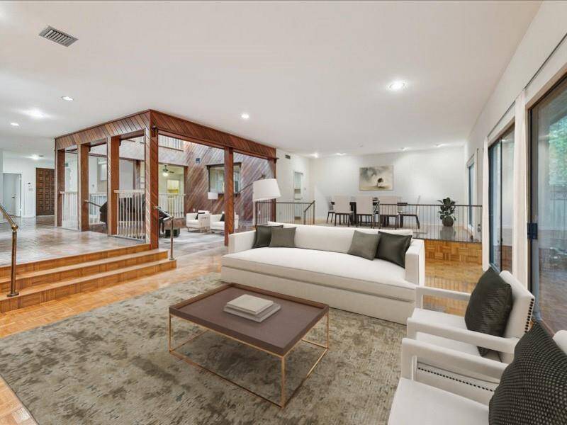 Another view of living and dining area virtually staged.