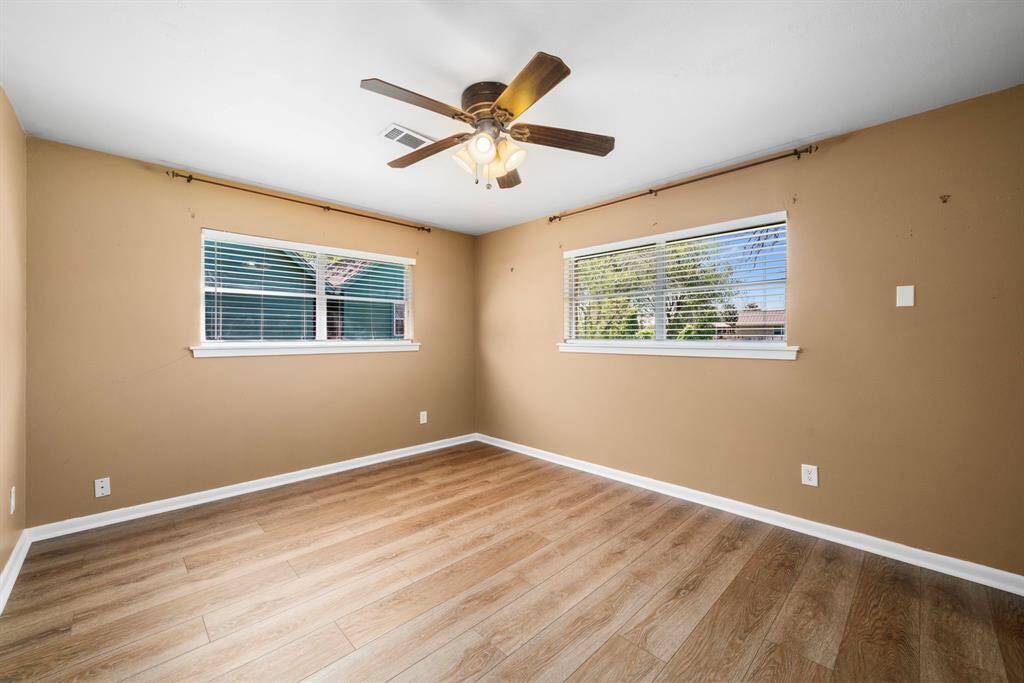 Expansive primary bedroom will be your escape at the end of a busy day. Ample room for large scale furniture.
