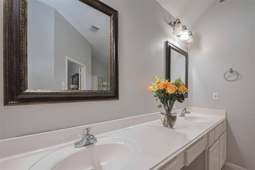 Additional view of the sinks and vanity