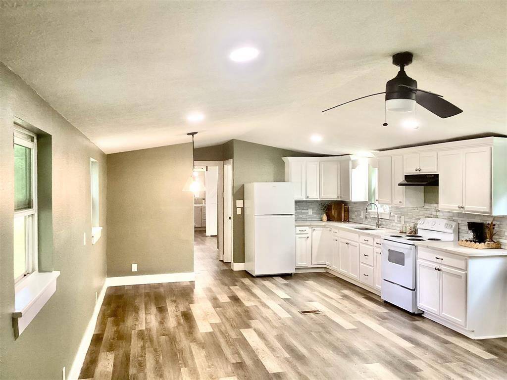 Updated open-concept kitchen and dining area.